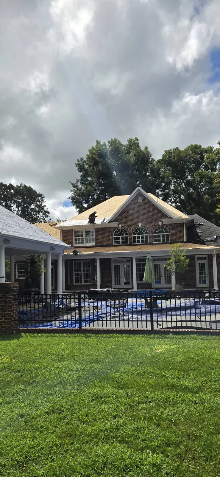 New roof construction underway on a residential property
