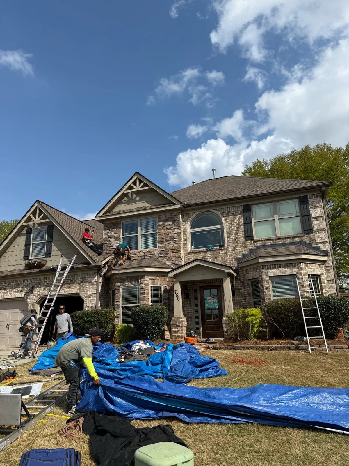 Rhino Roofing residential project with property protection in place