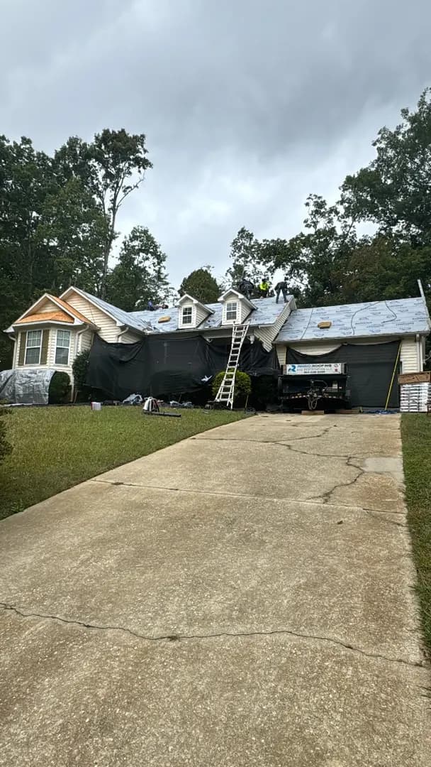 Roofing crew working on an Upstate home